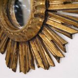 Miroir soleil en bois doré 1950