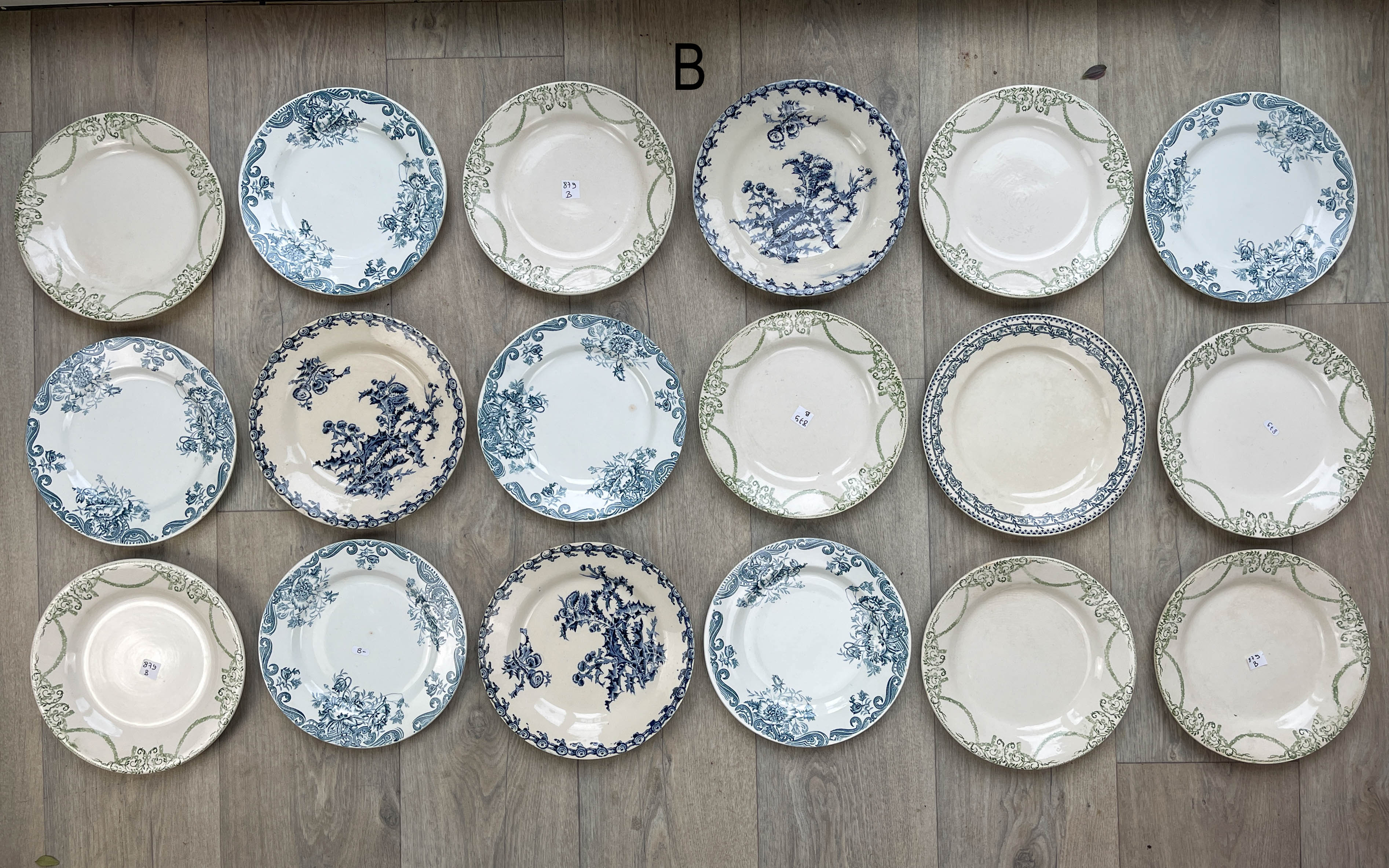 6 green and blue mismatched iron earth plates