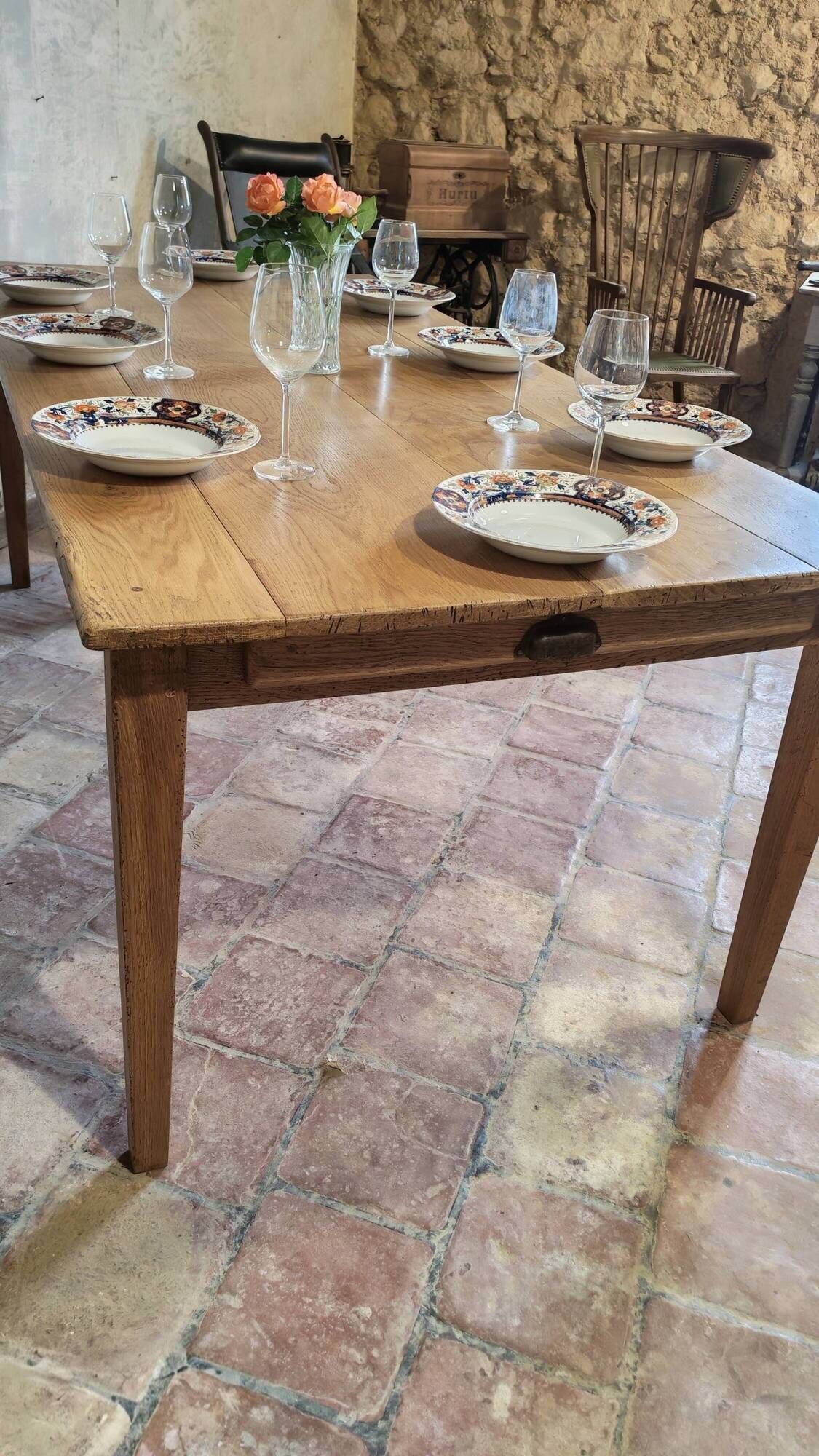 Large authentic farmhouse table made of solid French oak.