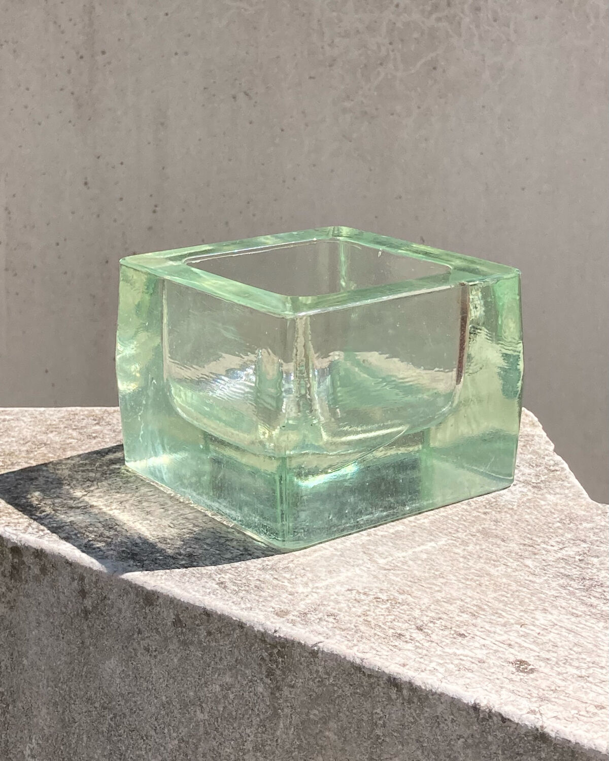 Empty pocket 70s molded glass