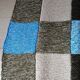 Hand knitted patchwork plaid