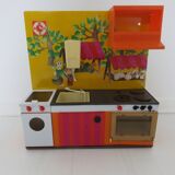 Kitchen doll, child in tole 70s