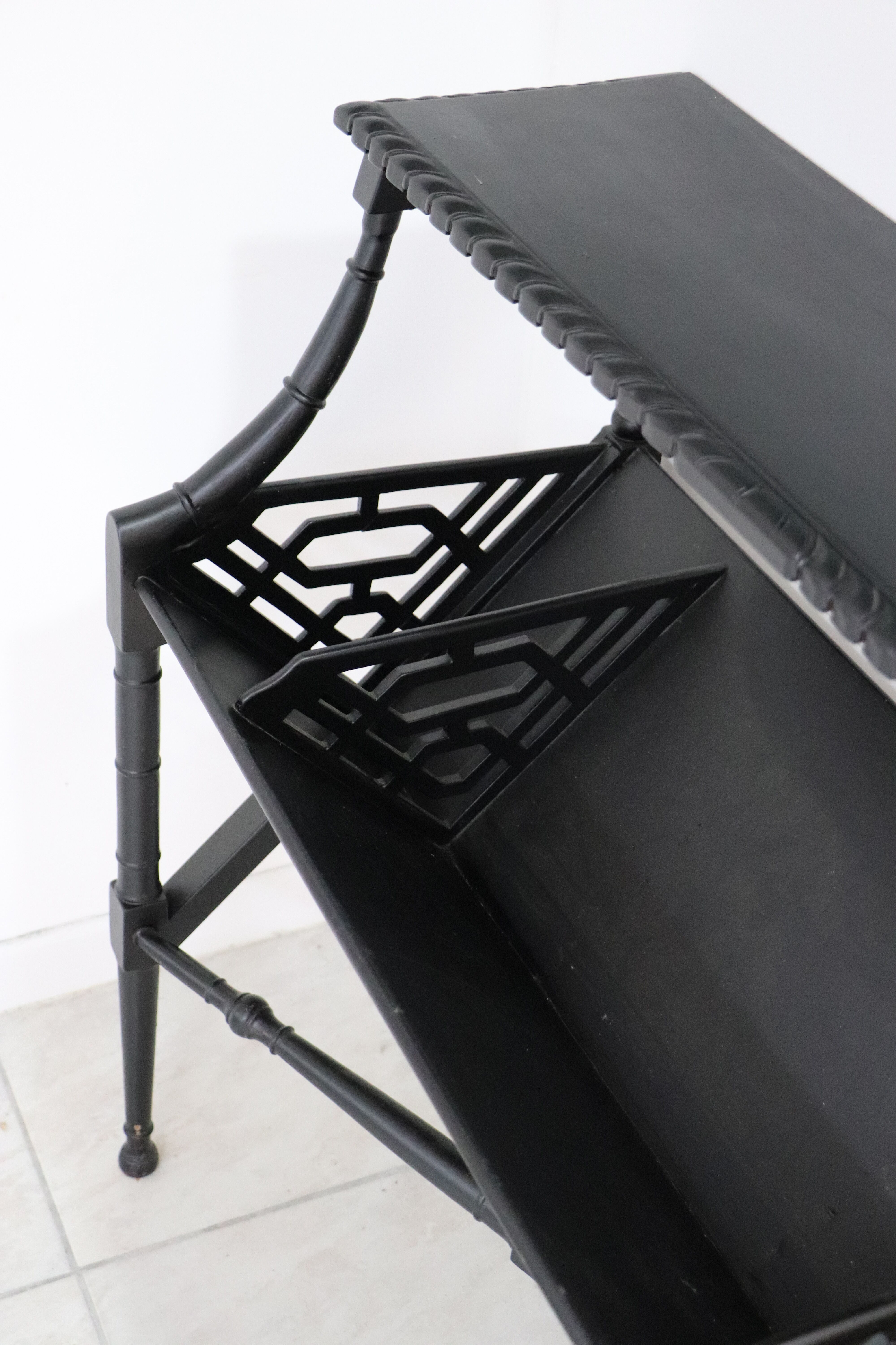 Black lacquered Indochinese console with disk storage