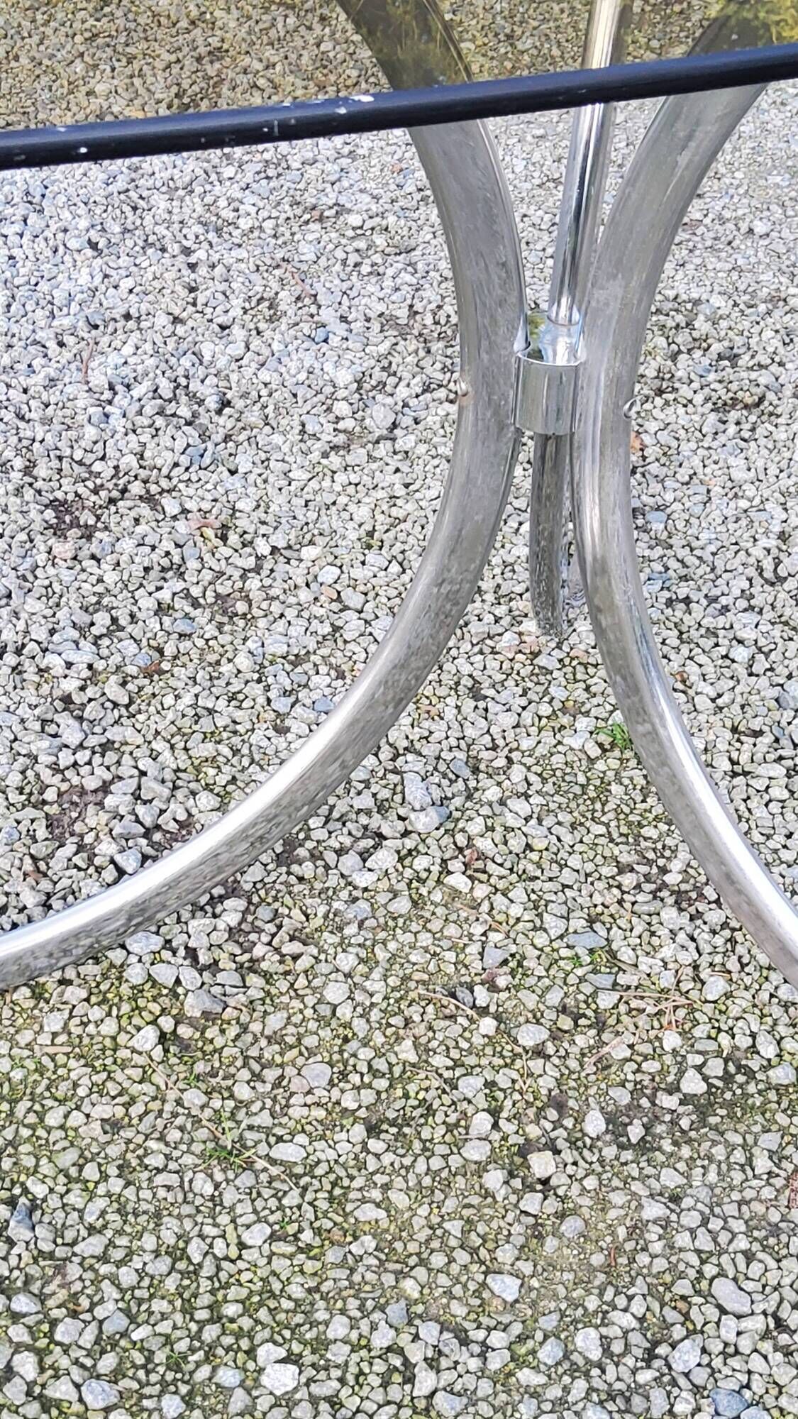 Designer table from the 70s, smoked glass top, chrome base