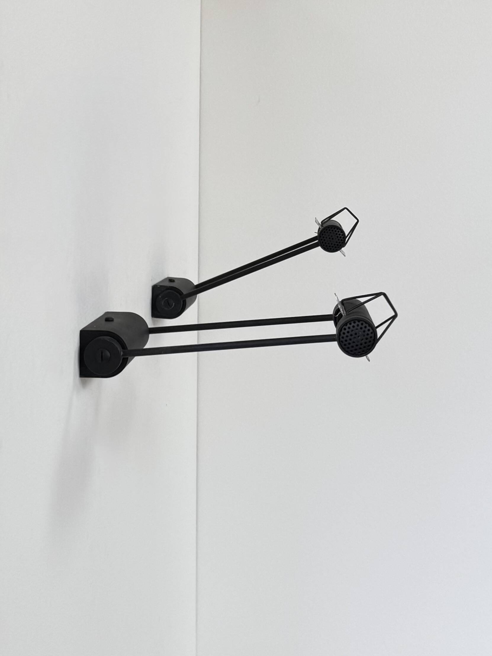 Pair of adjustable vintage wall lights, matte black metal, Italy, 1980.