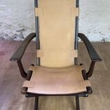 Colonial style leather armchair and ottoman