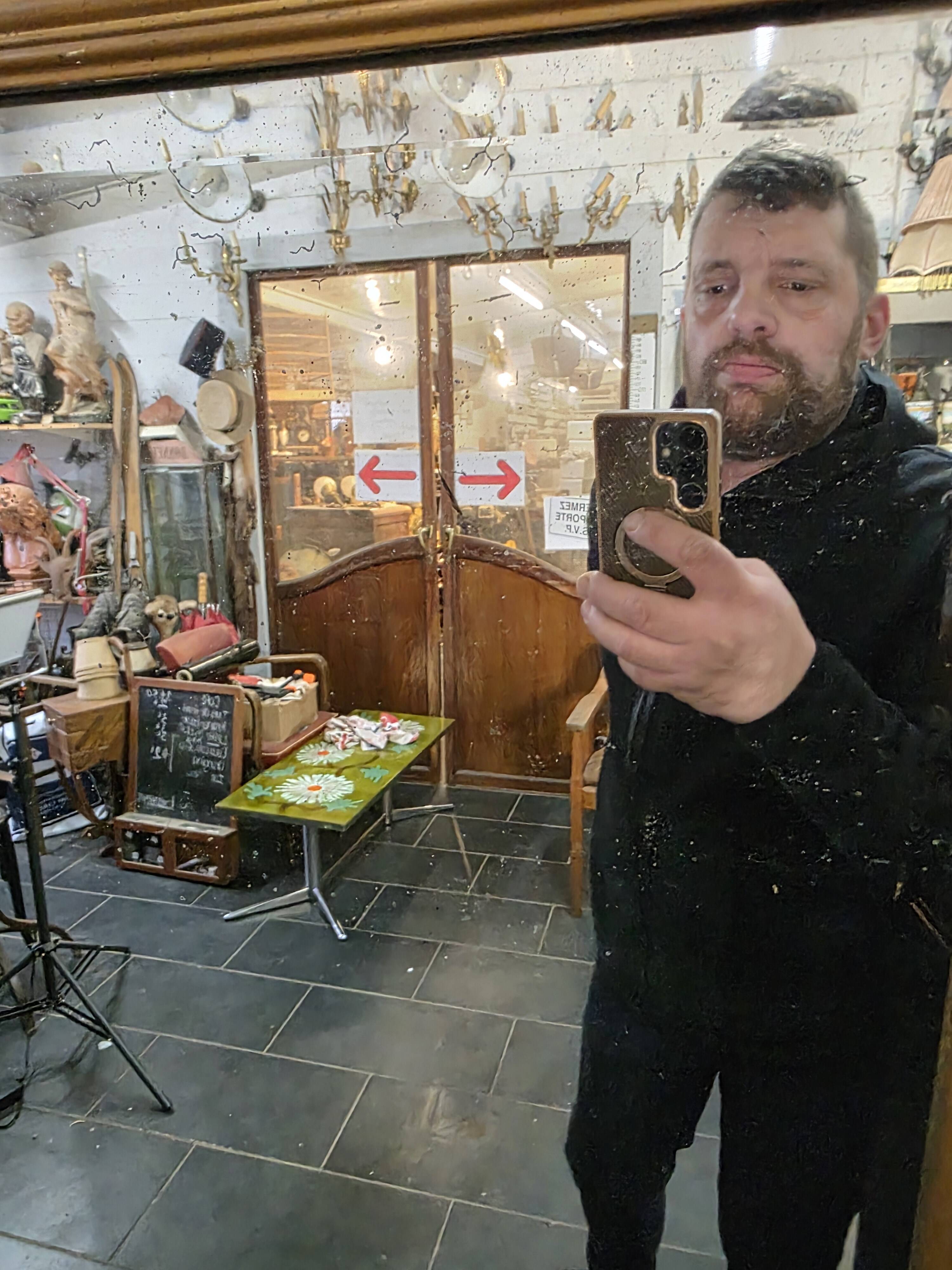 Art Deco gilded trumeau, bevelled mirror