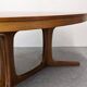 Oval extendable dining table by Baumann, France circa 1970.