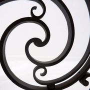 Art Nouveau Wrought iron tripod floor candlestick