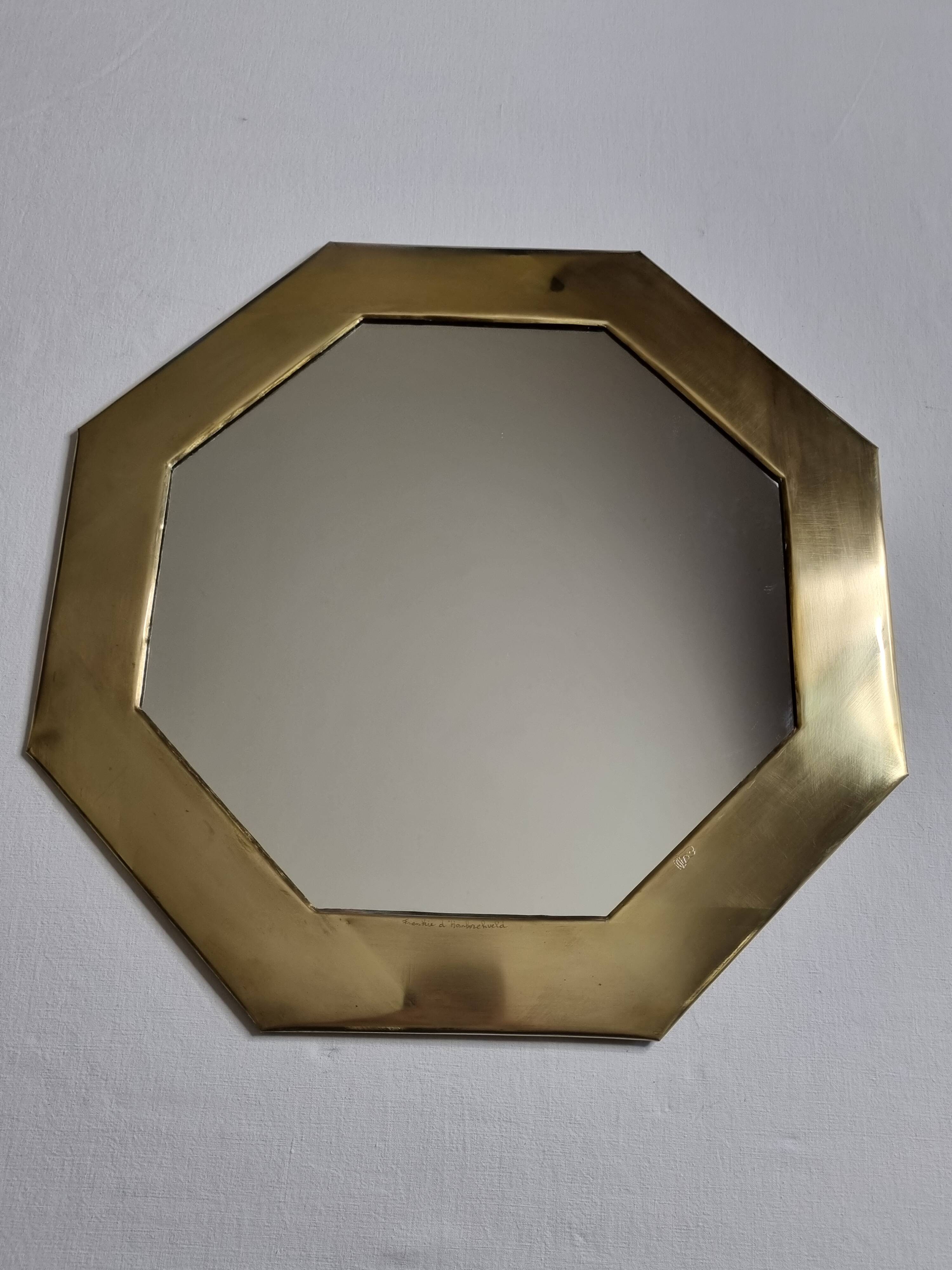 Octagonal brass mirror signed Frankie d'Homborchveld, 47 x 50 cm