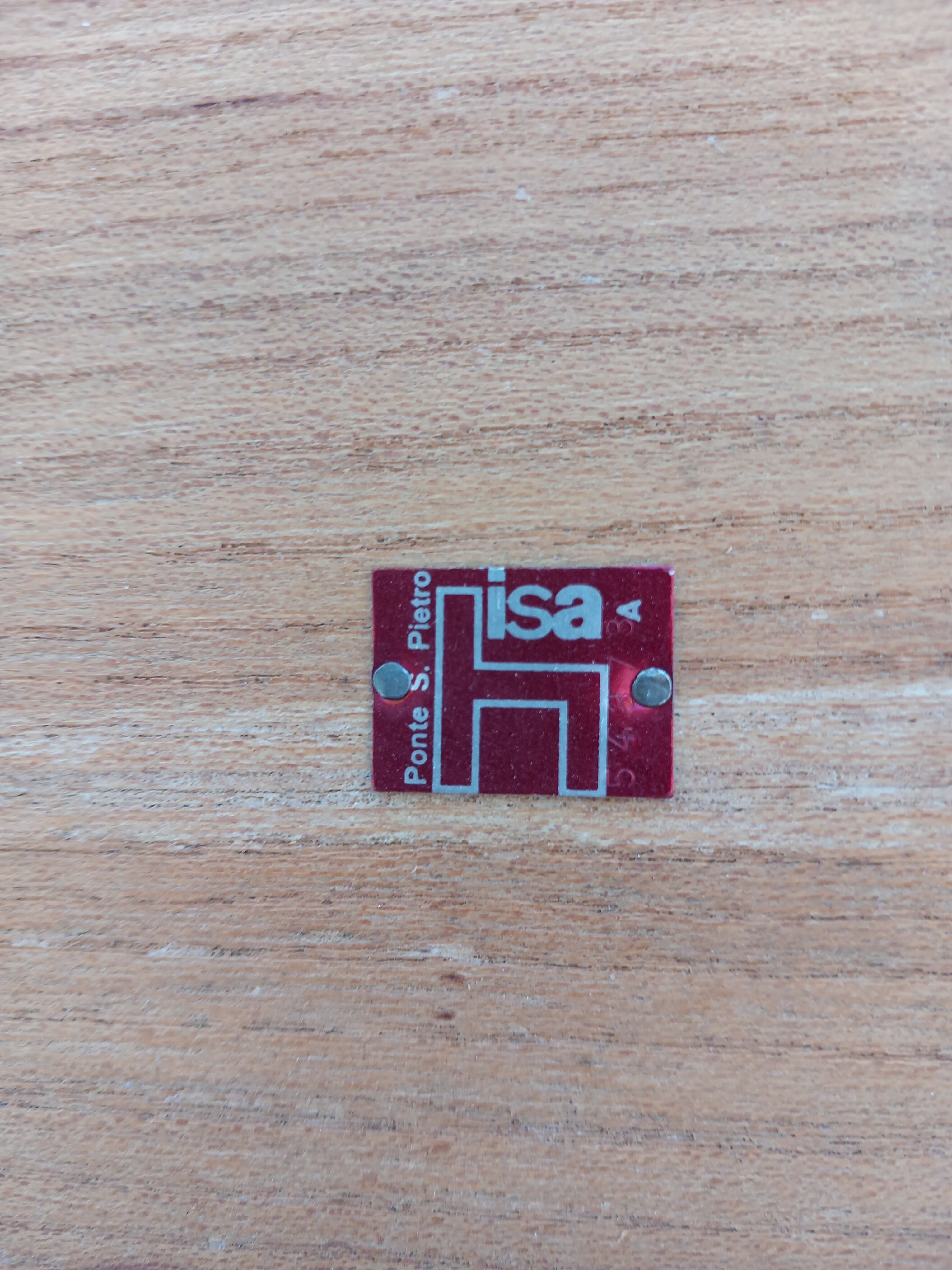 Suite of two vintage modernist Isa coffee tables in teak and black metal from the 60s