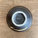 Ceramic pocket emptier - Tim Andrews