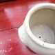 Off-white sandstone pot
