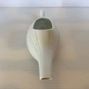 White porcelain sauceboat antique baby bottle