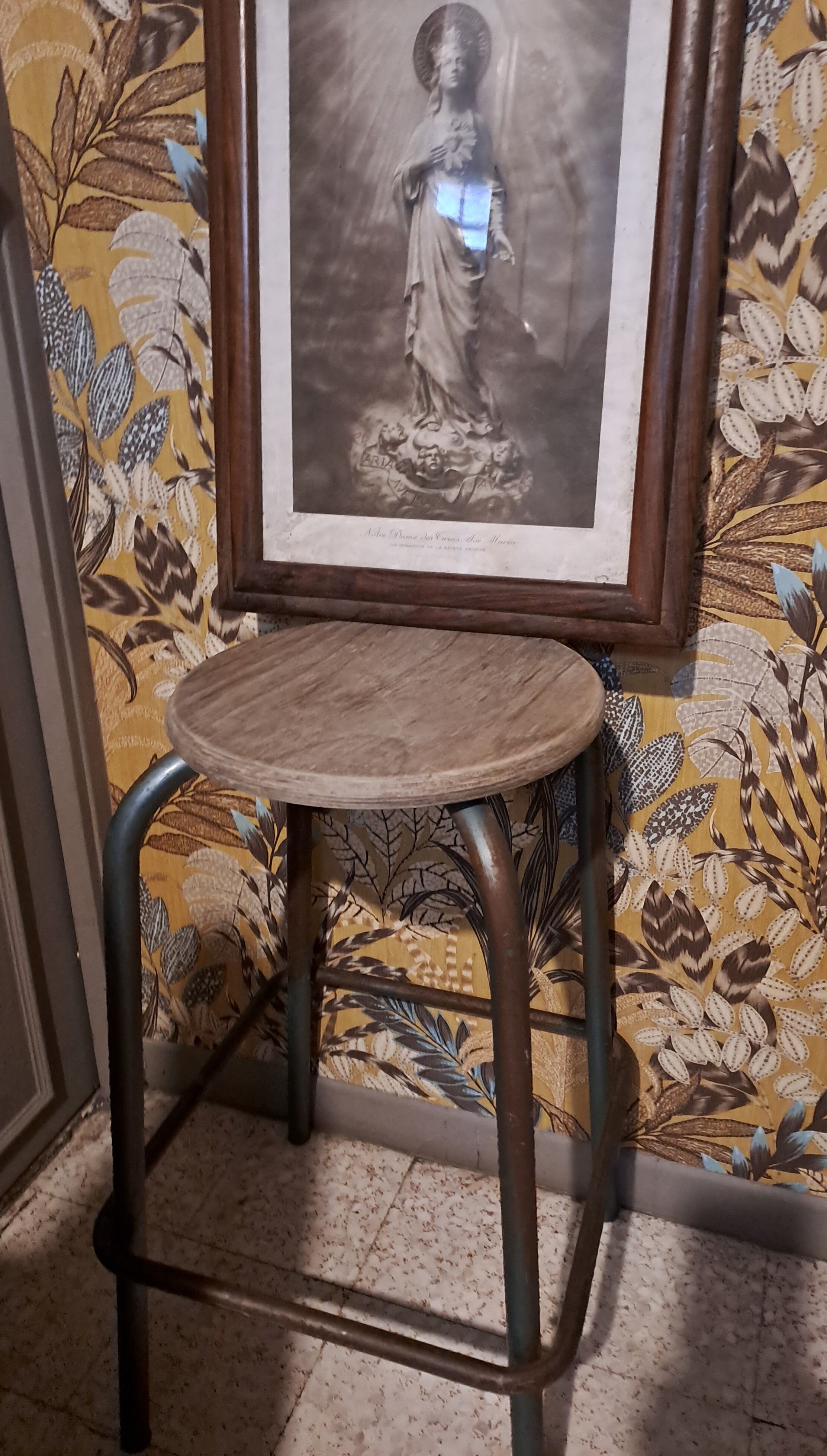 High metal stool and wooden seat Labo style dating from the 1940s industrial style