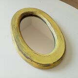 Small antique oval mirror