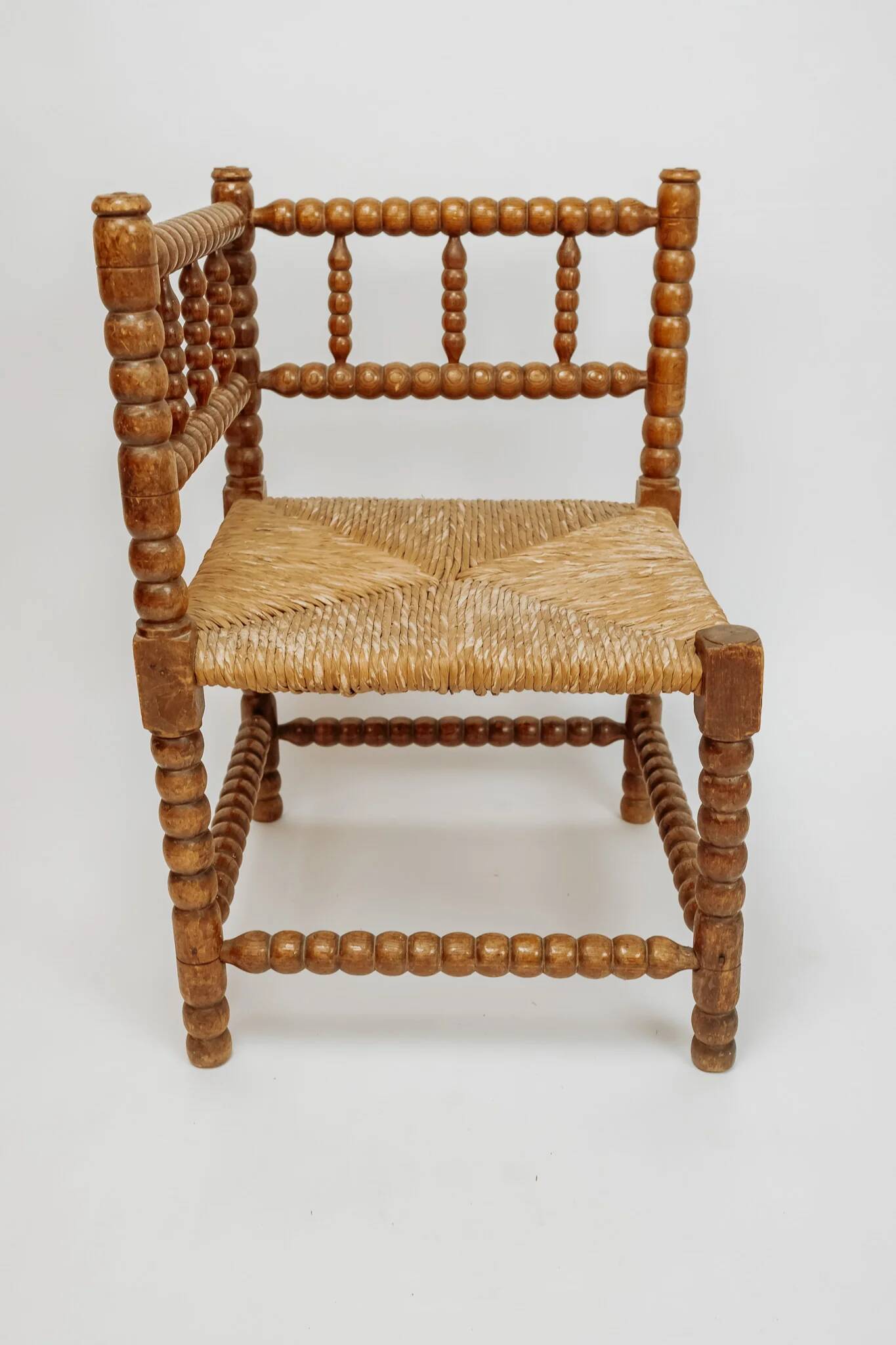 Classic vintage bobbin corner armchair