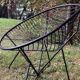 Pair of round chairs in black tubular steel 1960