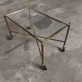 Rolling coffee table in vintage gilded bronze