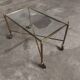 Rolling coffee table in vintage gilded bronze