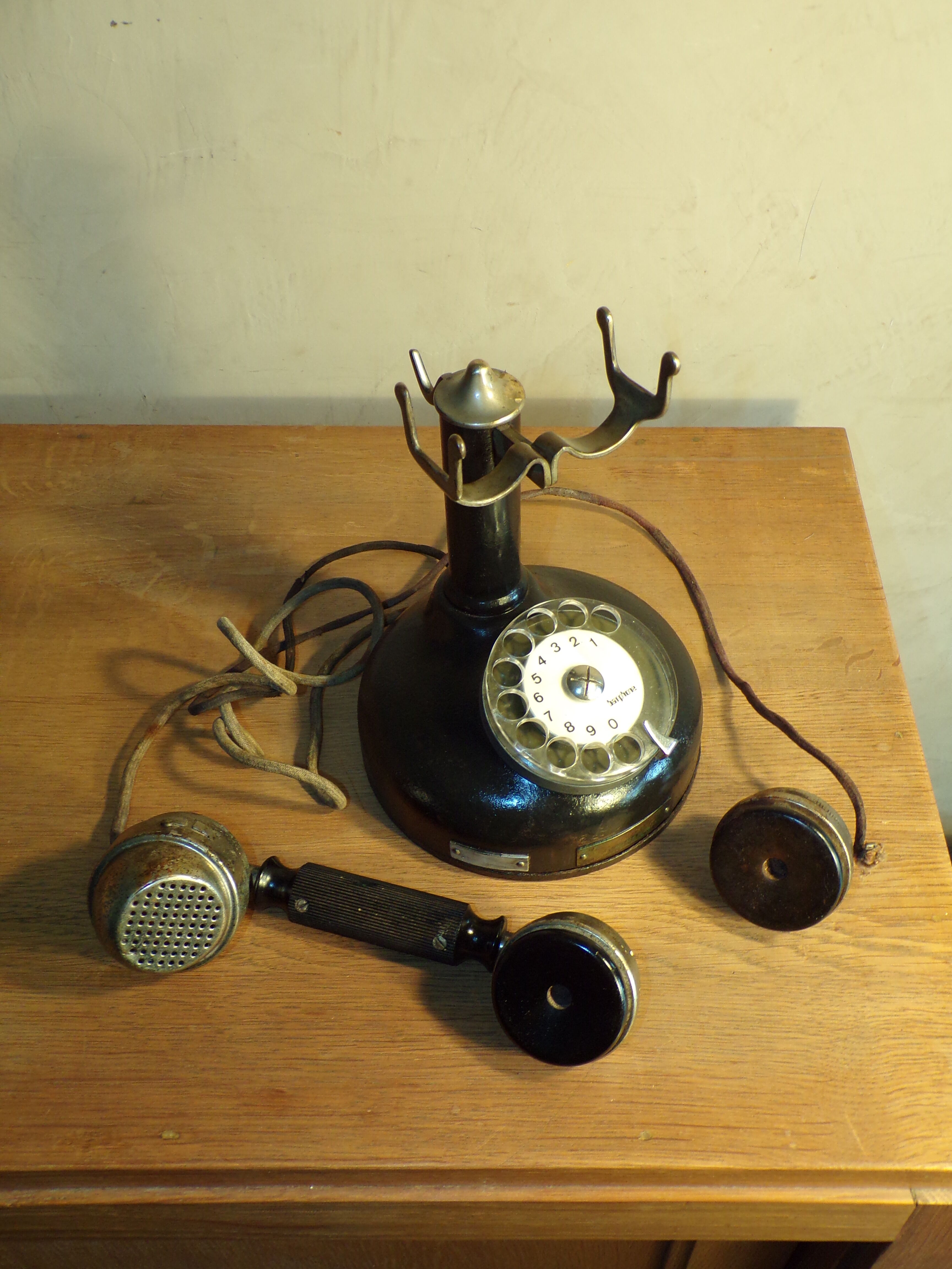 Old Bakelite column and metal phone