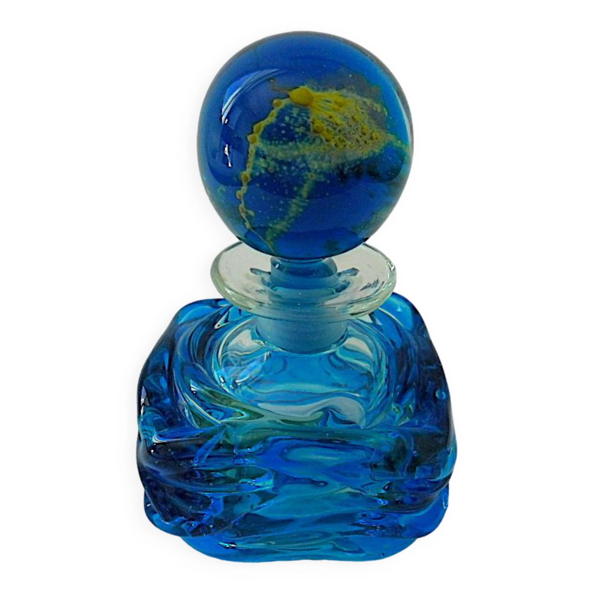 Blown blue glass bottle with inclusions