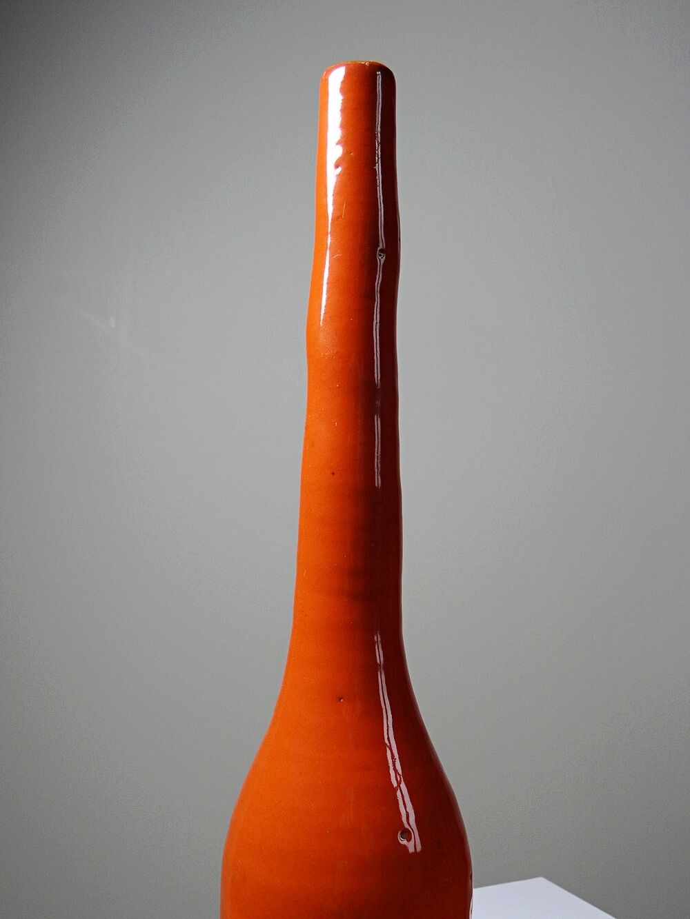 Bright orange mid-century decorative bottle lamp base glazed pottery.