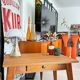 Old wooden desk or side table with compass legs