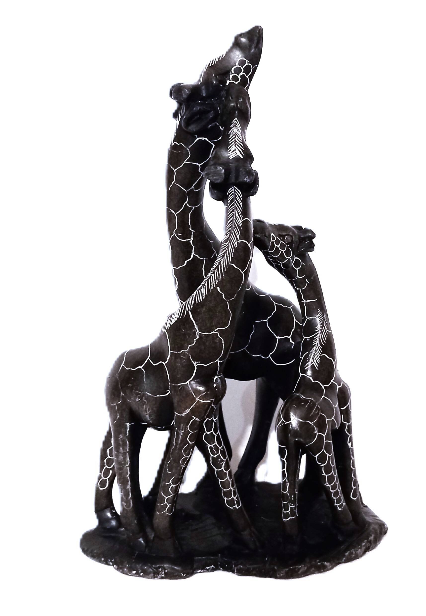 African stone sculpture of 3 Giraffes