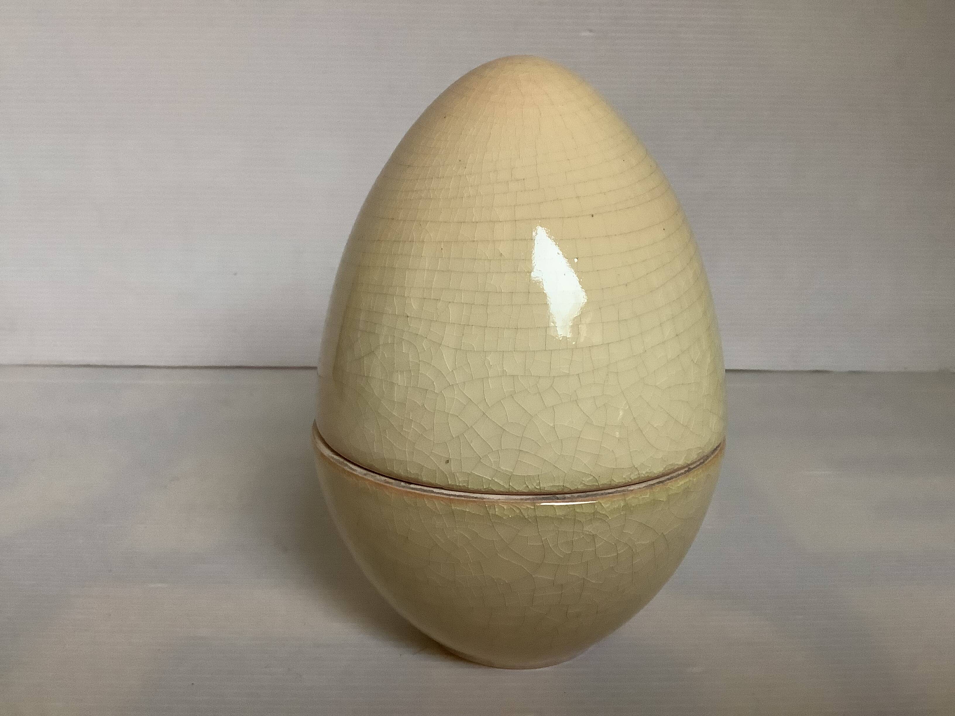 Candy box in the shape of an egg cracked ceramic