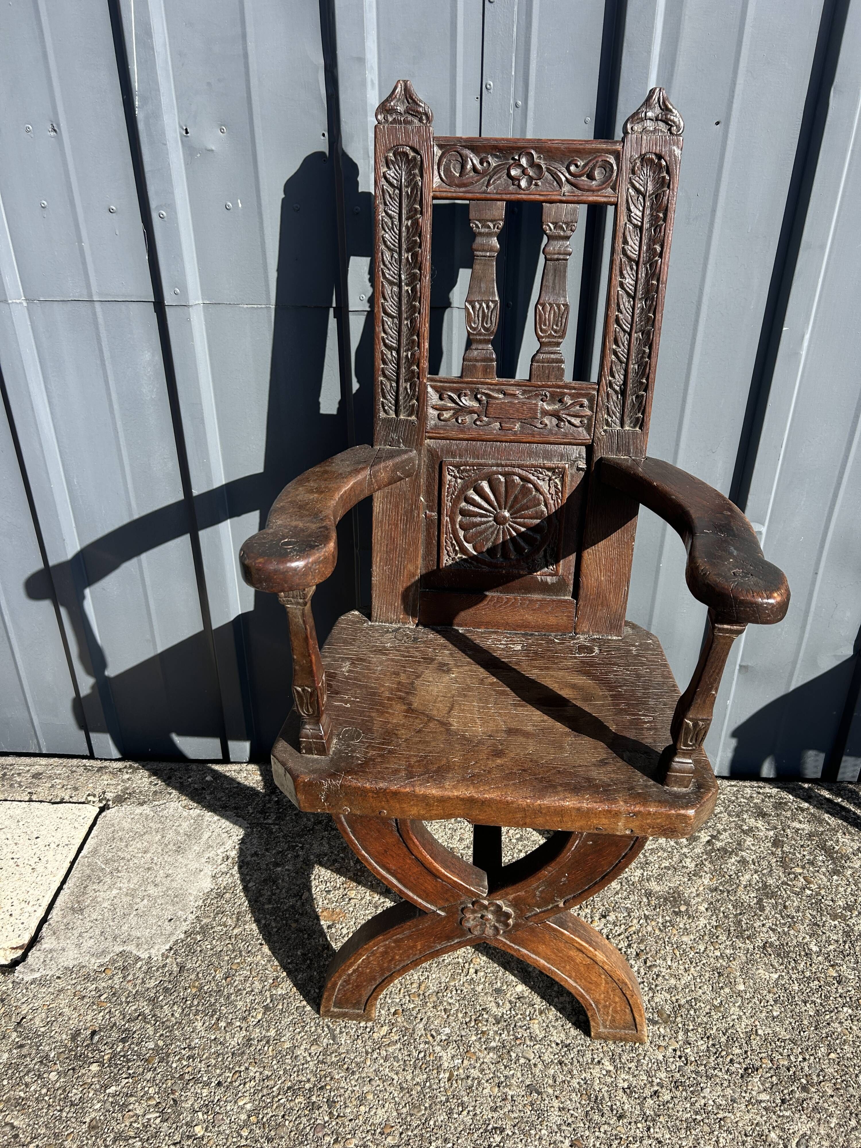 Antique oak armchair, high period
