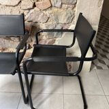 Pair of black armchairs