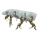 Hollywood Regency style coffee table, 6 patinated brass horses and glass top, 1970.