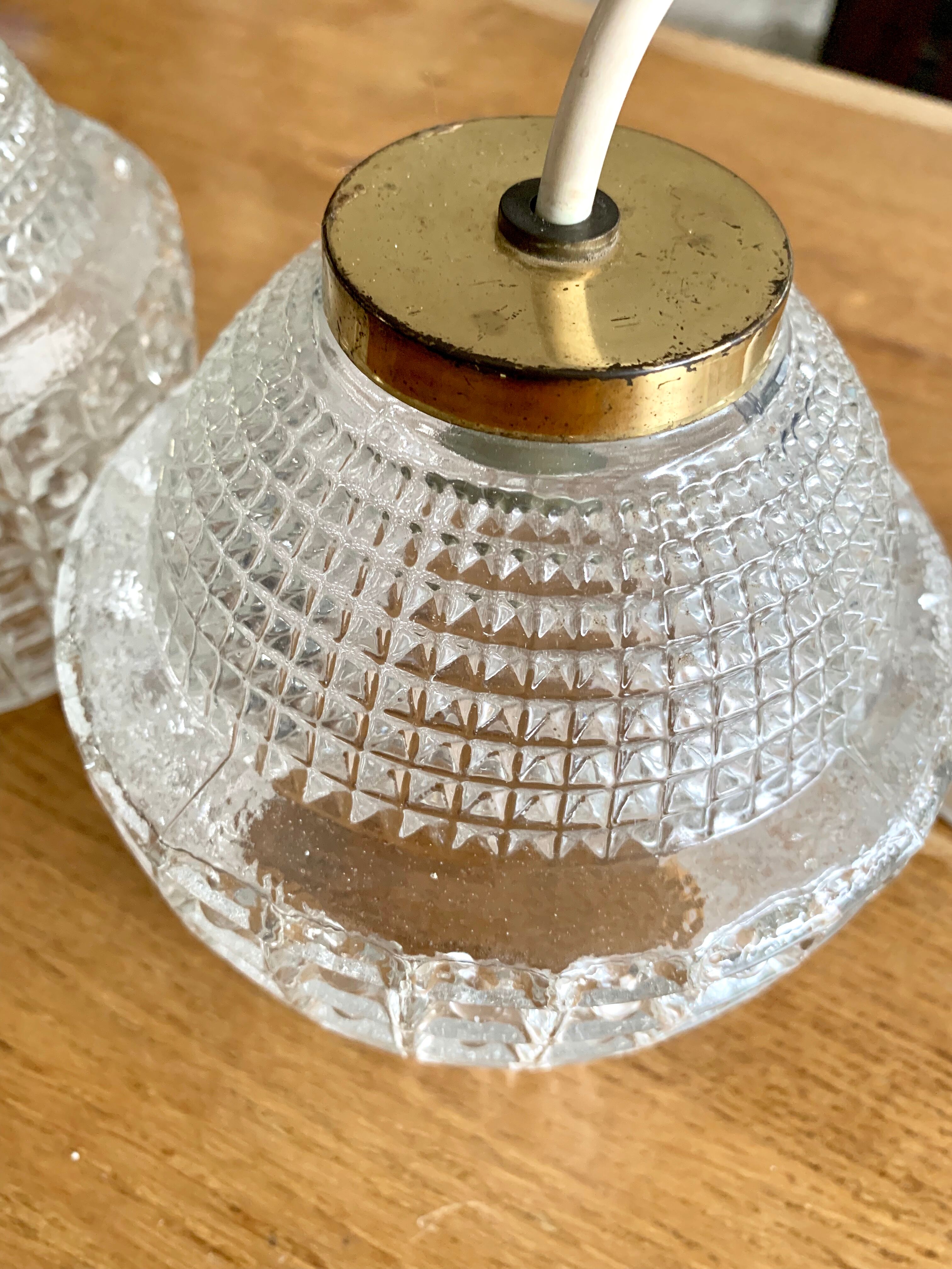 Pair of glass and vintage brass suspension