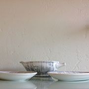 Two raviers and a white and grey cermal sauciere