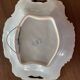 Plat rocaille porcelaine de Rouen