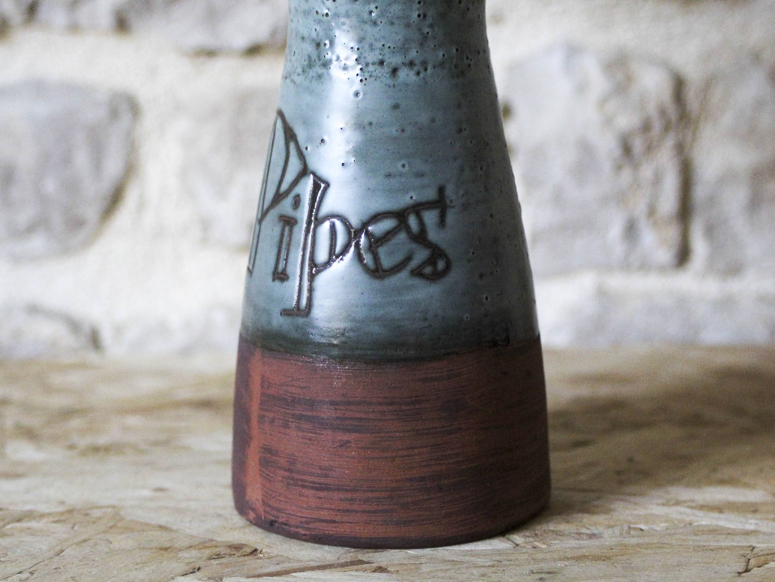 Ceramic pipe holder vase