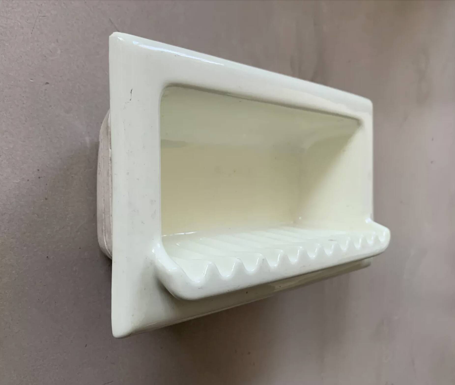 Recessed wall-mounted soap dish