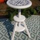 Adjustable screw stool in patinated wood