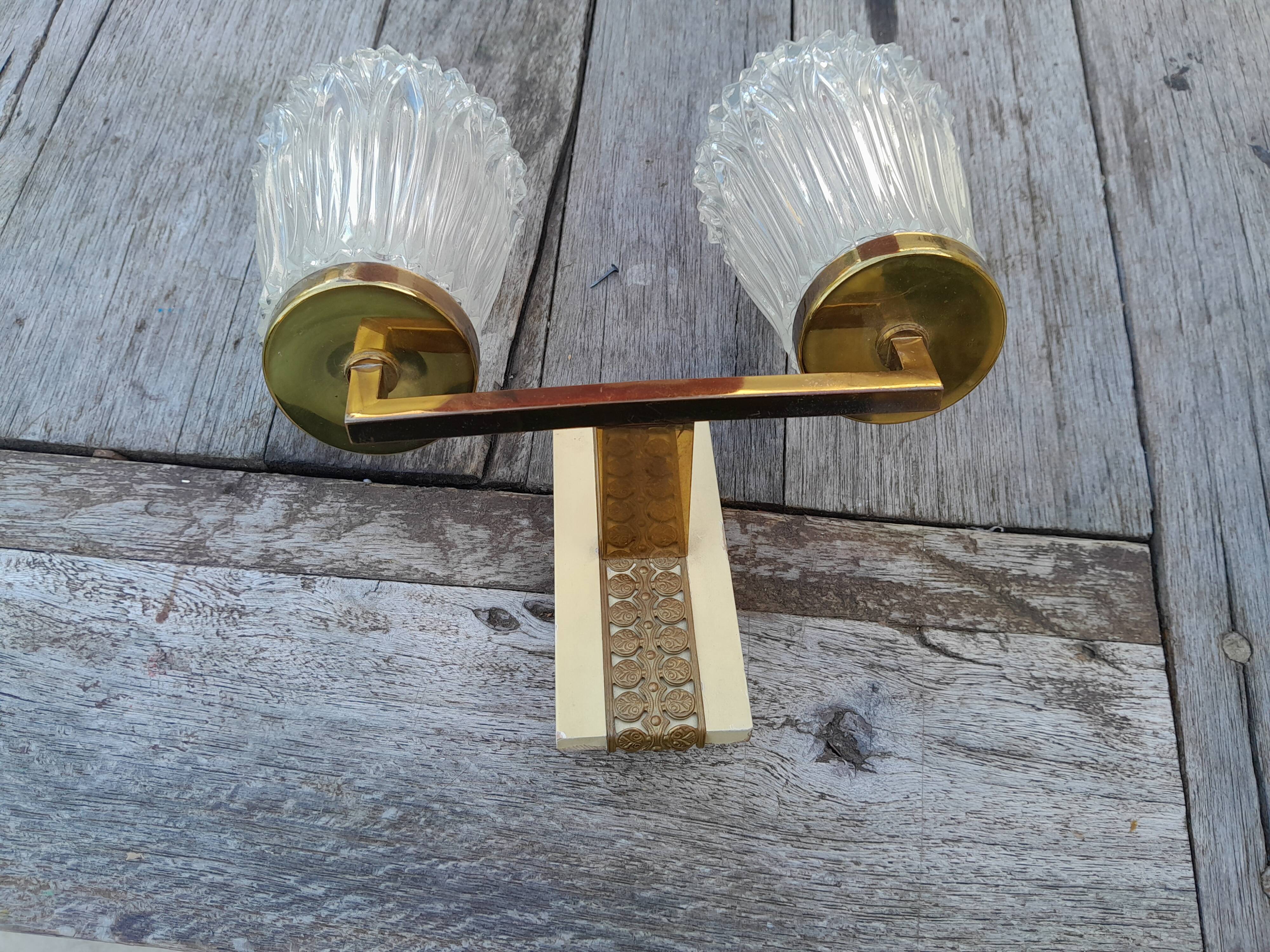 Pair of vintage wall lights from the 50s and 60s in brass glass