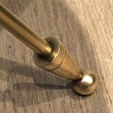 Round brass and mahogany sofa end from Jansen