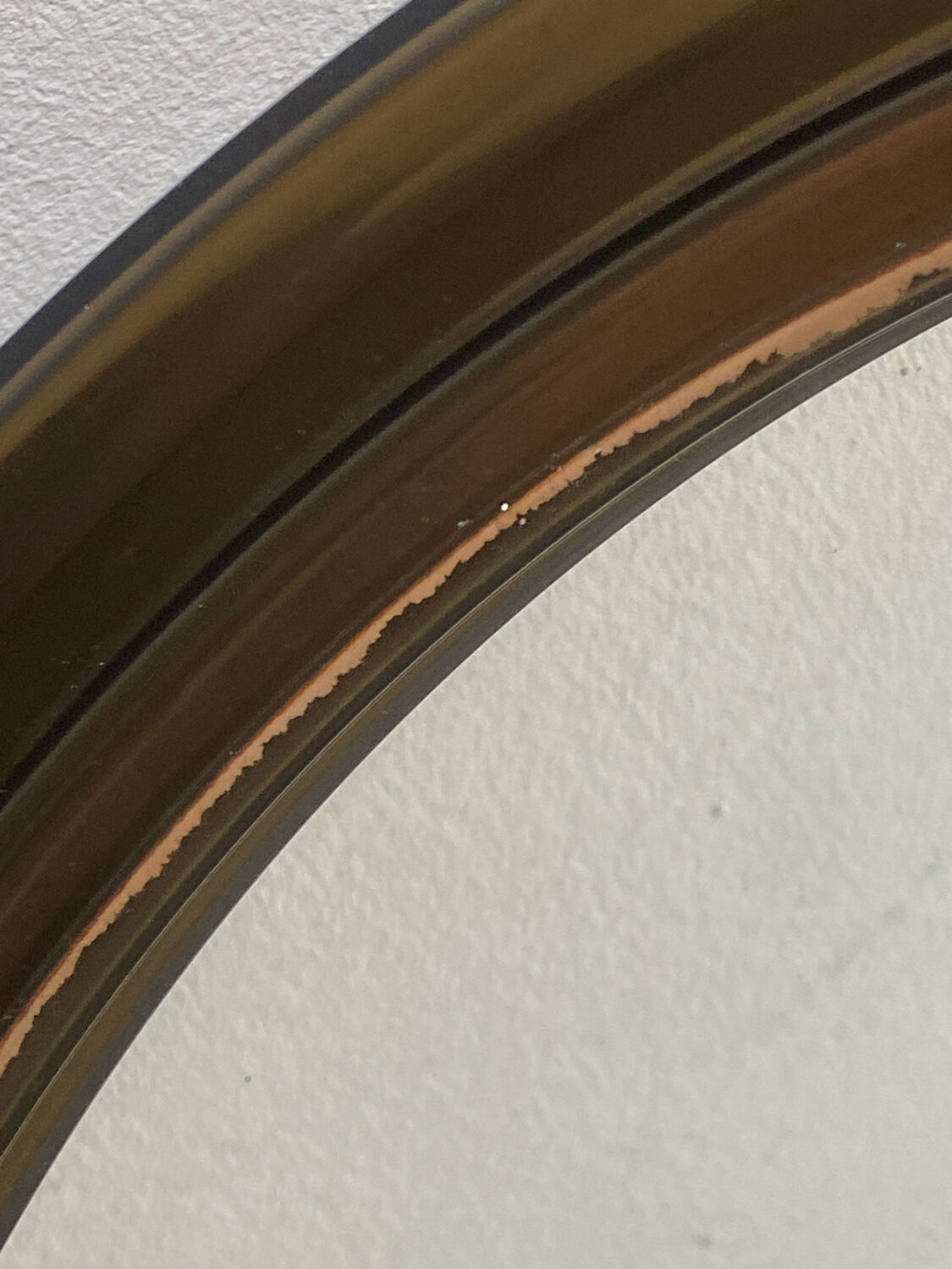 Circular mirror, smoked plastic, 1960s/70s.