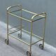 Minimalist solid brass server from the 60s