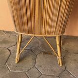 Vintage rattan bar from the 60s with rounded shapes and a shelf for glasses