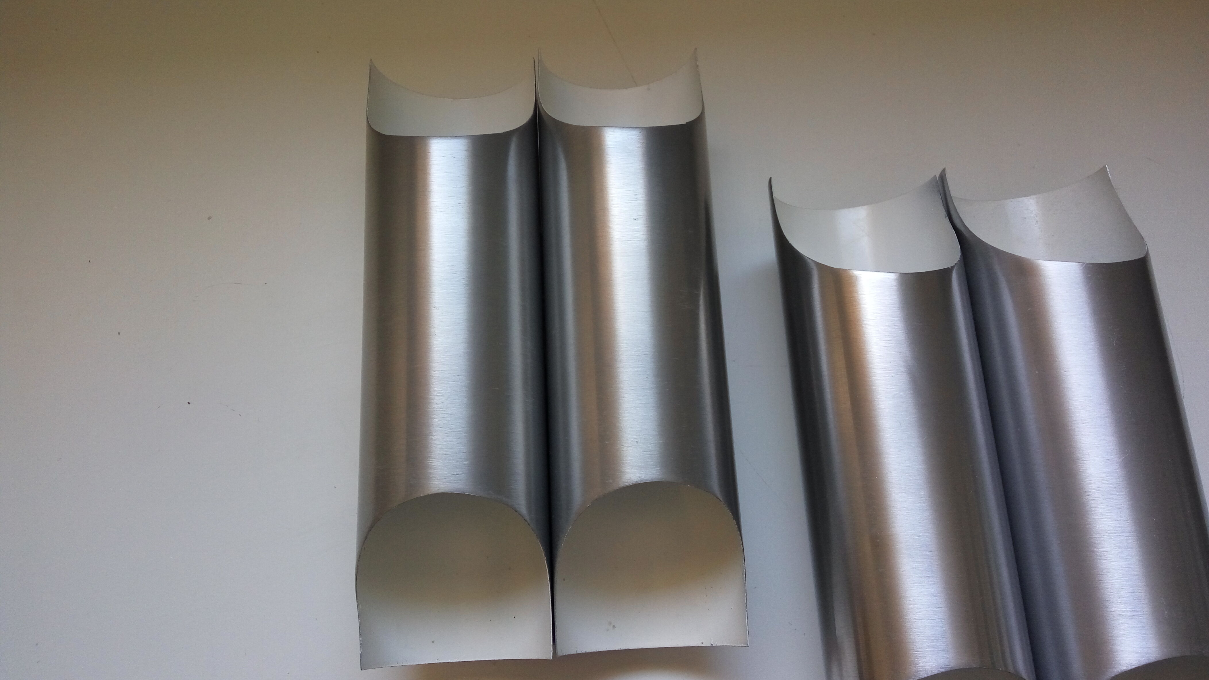 Pair of wall sconces by Fugue Raak