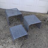 Nested tables with perforated metal from the 1980s.