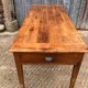 Antique cherry farmhouse table with 2 drawers and 1 pull-out