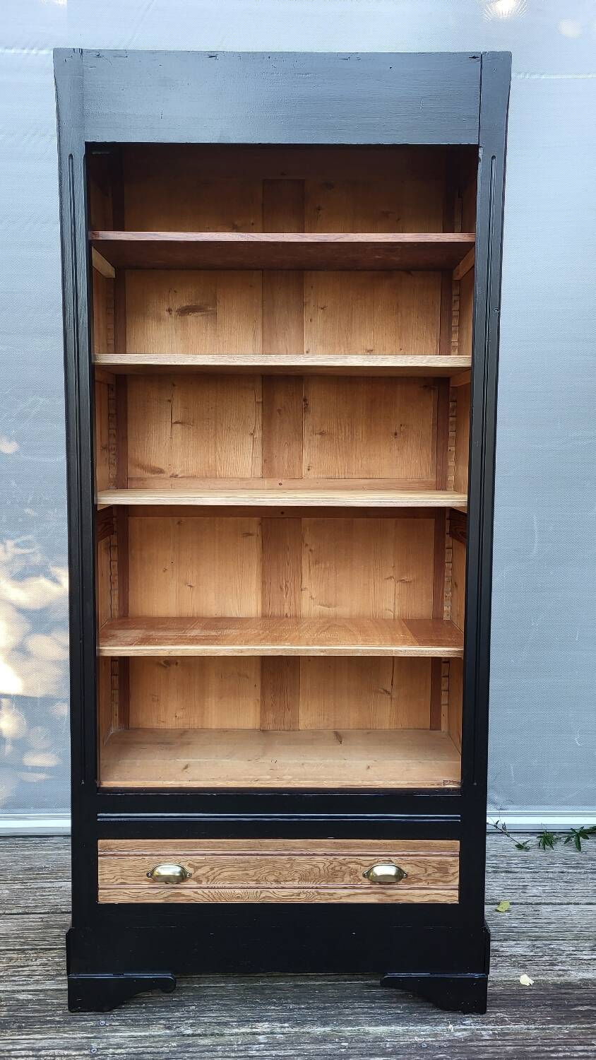 Two-tone black and honey bookcase
