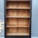Two-tone black and honey bookcase
