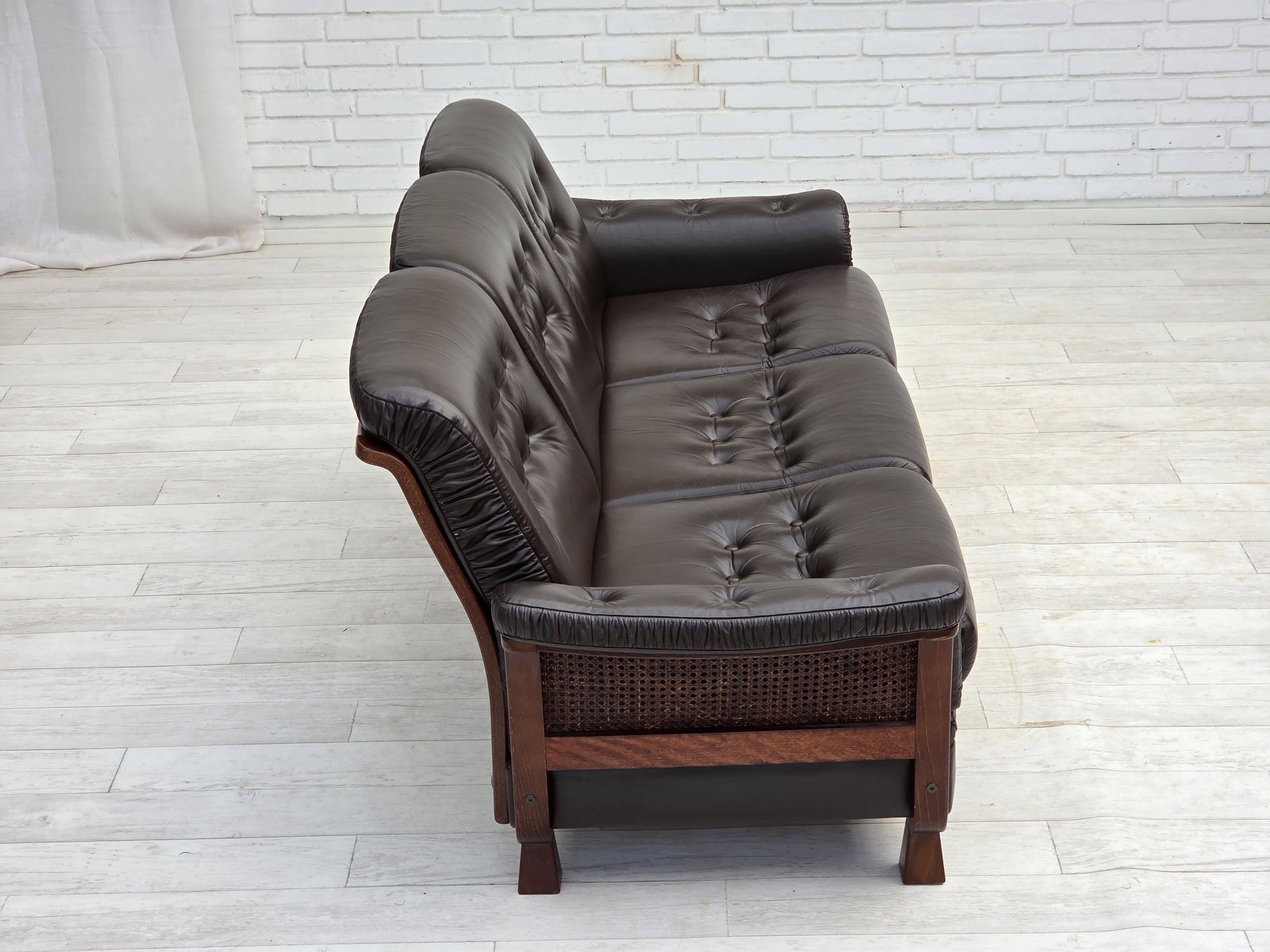 1970s, Scandinavian 3-seater sofa, furniture leather, teak wood legs.